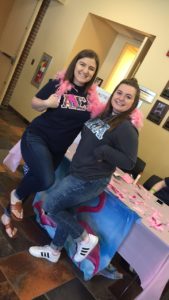 Two Alpha Sigma Alpha Sisters in the Flocking Stance