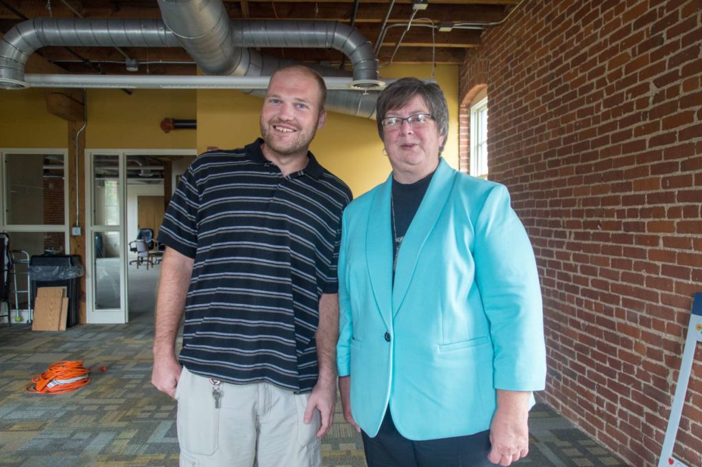 Home and community man and woman standing side by side
